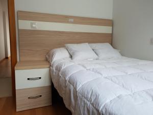 Łóżko lub łóżka w pokoju w obiekcie Vila, 132