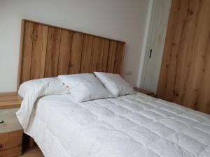 Łóżko lub łóżka w pokoju w obiekcie Vila, 132