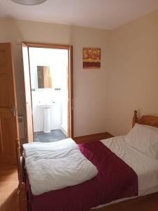 Postel nebo postele na pokoji v ubytování 1 Coirneal Chearta