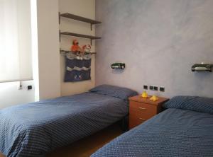 Posteľ alebo postele v izbe v ubytovaní Apartament amb jardí privat i piscina