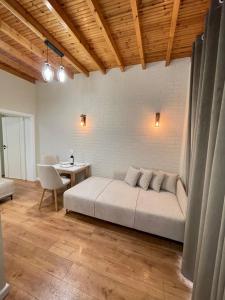 Arial Penthouse Suites客房内的一张或多张床位