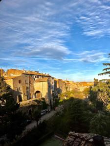 a view of a city with buildings and trees at Nazareth Residence in Viterbo