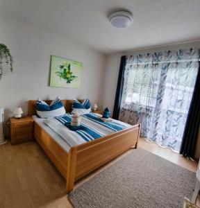 Postel nebo postele na pokoji v ubytování Gästehaus Rettl