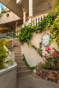 Ein Garten an der Unterkunft Villa Caprichosa Boutique Hotels
