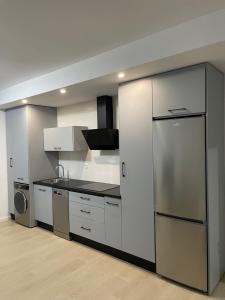 Virtuvė arba virtuvėlė apgyvendinimo įstaigoje Apartamento Luda