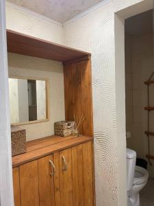 a bathroom with a mirror and a toilet at Debatoun in Debed