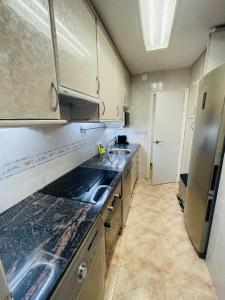 Kuchyňa alebo kuchynka v ubytovaní Beach Apartment Barca 6