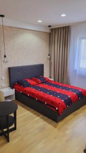 Легло или легла в стая в Garsoniera în centrul orașului vis a vis de hotel radisson