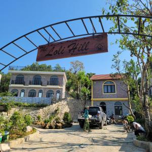 a sign for the latin club in front of a building at The Loli Hill Homestay in Ninh Binh