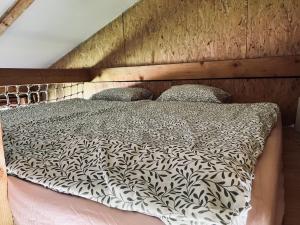 Postel nebo postele na pokoji v ubytování Ubytování na Ranči pod Lovošem