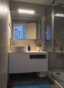 Koupelna v ubytování Apartamento Deluxe AM + 10 fotografií