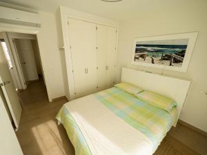 タリファにあるLankarifa Apartmentのベッドルーム1室(ベッド1台付)が備わります。