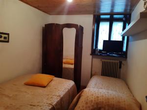 Postel nebo postele na pokoji v ubytování Dimora Monte Camicia