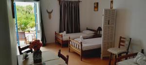 Posteľ alebo postele v izbe v ubytovaní Fragos Apartments