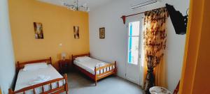 Posteľ alebo postele v izbe v ubytovaní Fragos Apartments