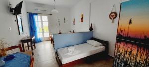 Posteľ alebo postele v izbe v ubytovaní Fragos Apartments