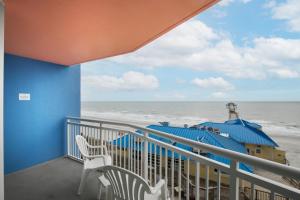 a balcony with a view of the ocean at Prince Resort in Myrtle Beach