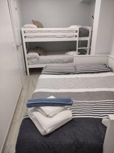 A bed or beds in a room at El Rincón de Moreno