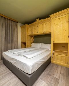 Posteľ alebo postele v izbe v ubytovaní Chalet Margoni