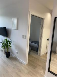 Posteľ alebo postele v izbe v ubytovaní Apartament MORENA