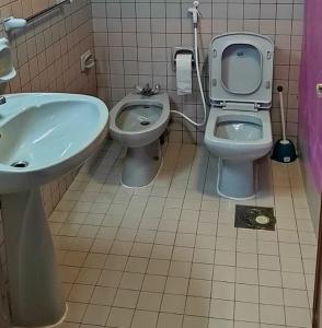 Koupelna v ubytování ComfyDees Apartments
