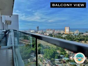 a view of the city from the balcony of a building at Sky2Sea Penthouse @ Icon Residences in Kuala Terengganu