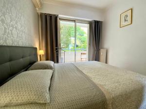 Ένα ή περισσότερα κρεβάτια σε δωμάτιο στο Le Panomagique +15 φωτογραφίες