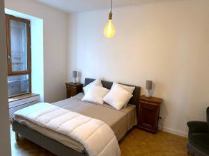 Postel nebo postele na pokoji v ubytování Appartement le saint Pierre