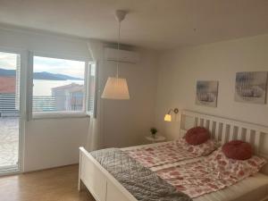 Postel nebo postele na pokoji v ubytování Studio-Appartements Emwey