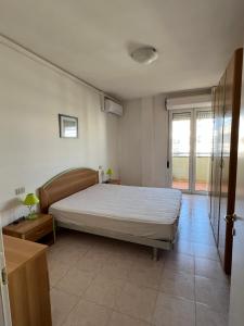 Postel nebo postele na pokoji v ubytování App. Mare V&V Caorle