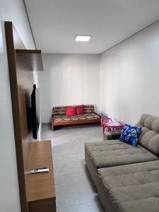 Posezení v ubytování Casa de Temporada Mouton + 9 fotografií