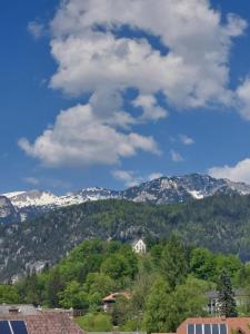 a view of a mountain range with snow covered mountains at Haus Jezek in Windischgarsten