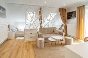 Posedenie v ubytovaní Apartamenty Defala i Strefa Relaksu Natural Touch