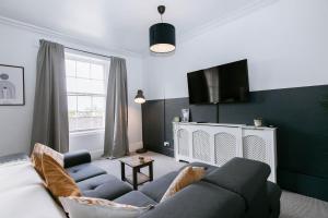 Et sittehjørne på Peaceful Apartment, Private Parking, Long Stay Prices, Close To Uni, Hosp, Centre