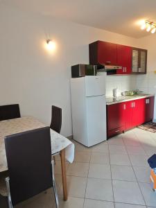 Kuchyň nebo kuchyňský kout v ubytování Apartments Bevanda