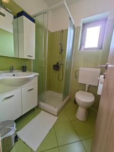 Koupelna v ubytování Apartments Bevanda