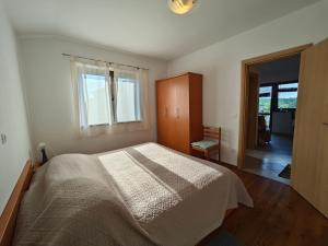Postel nebo postele na pokoji v ubytování Apartments Bevanda