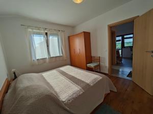 Postel nebo postele na pokoji v ubytování Apartments Bevanda