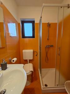Koupelna v ubytování Apartments Bevanda