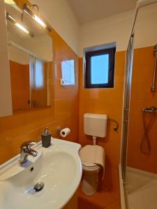 Koupelna v ubytování Apartments Bevanda