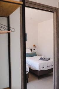 Postel nebo postele na pokoji v ubytování Villa luxe avec piscine et belle vue mer