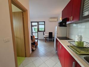 Kuchyň nebo kuchyňský kout v ubytování Apartments Bevanda