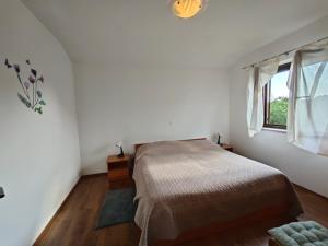 Postel nebo postele na pokoji v ubytování Apartments Bevanda