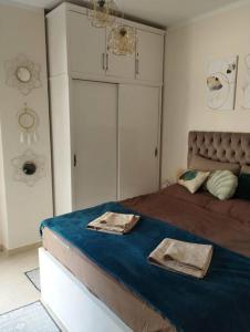 Кровать или кровати в номере Úplně nový apartmán v Tropical resort