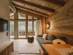 TV a/nebo společenská místnost v ubytování Gletscher-Chalet Stubai