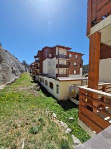 a row of buildings on the side of a street at Home sweet Valberg in Péone