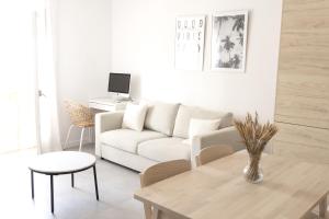 Posedenie v ubytovaní Apartamento con Parking a 50m de la playa
