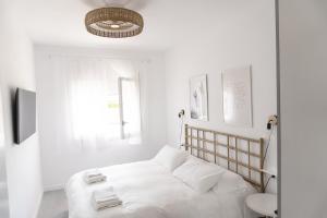 Posteľ alebo postele v izbe v ubytovaní Apartamento con Parking a 50m de la playa