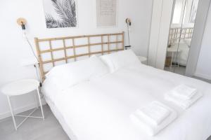 Posteľ alebo postele v izbe v ubytovaní Apartamento con Parking a 50m de la playa