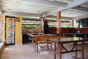 Restaurace v ubytování Recanto Pousada JU&JU com piscina COMPARTILHADA